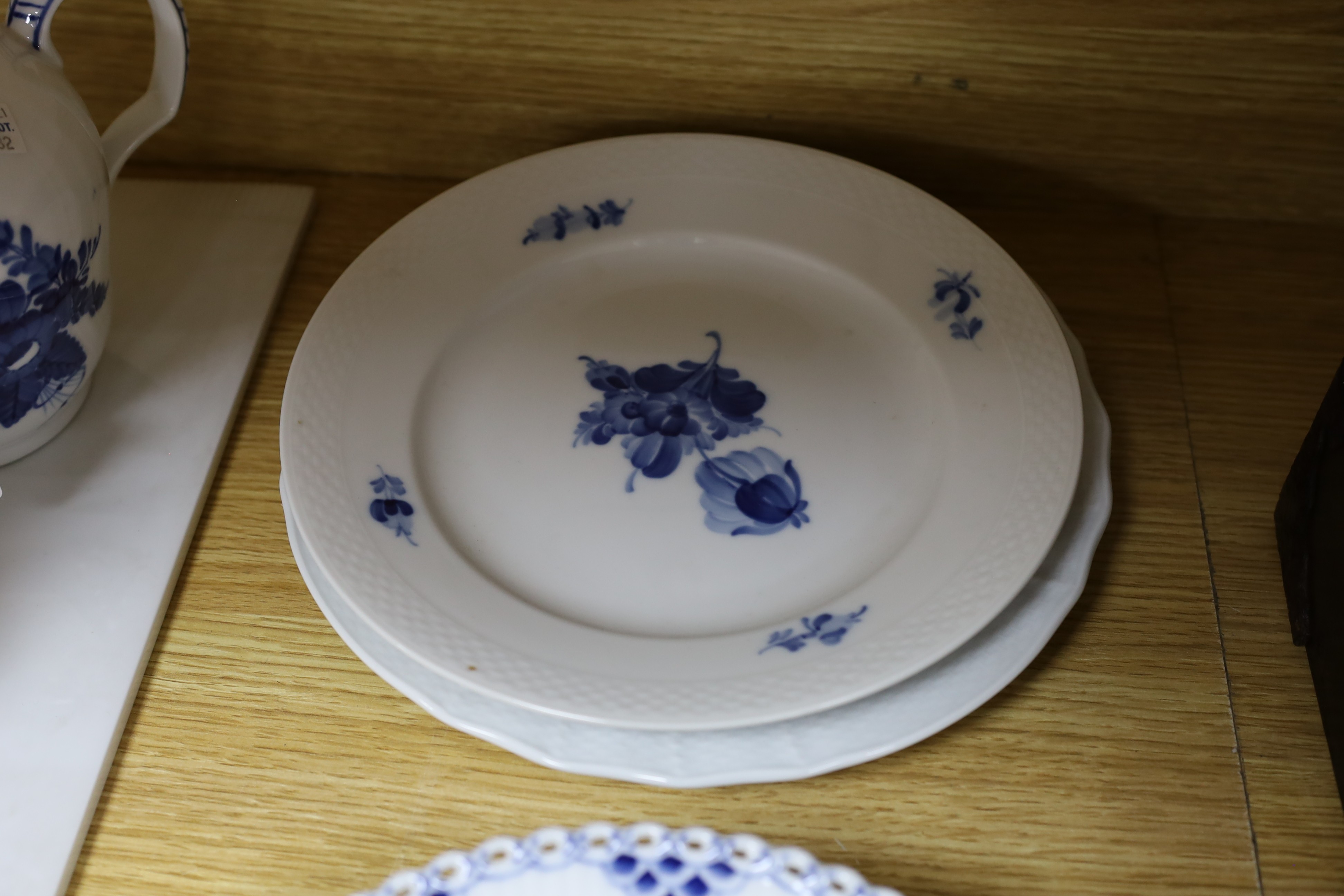A collection of varying patterns of Royal Copenhagen blue and white tableware